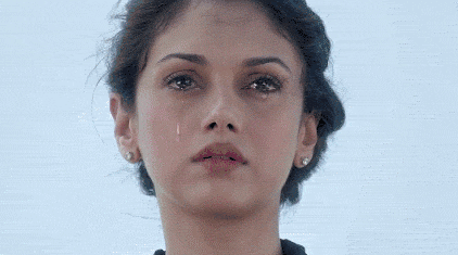 小时候的卢菲菲是个说话不清楚的