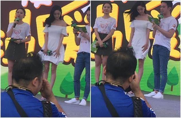 杨幂短裙被风起忙遮挡 摄影师抢拍走光被批没道德