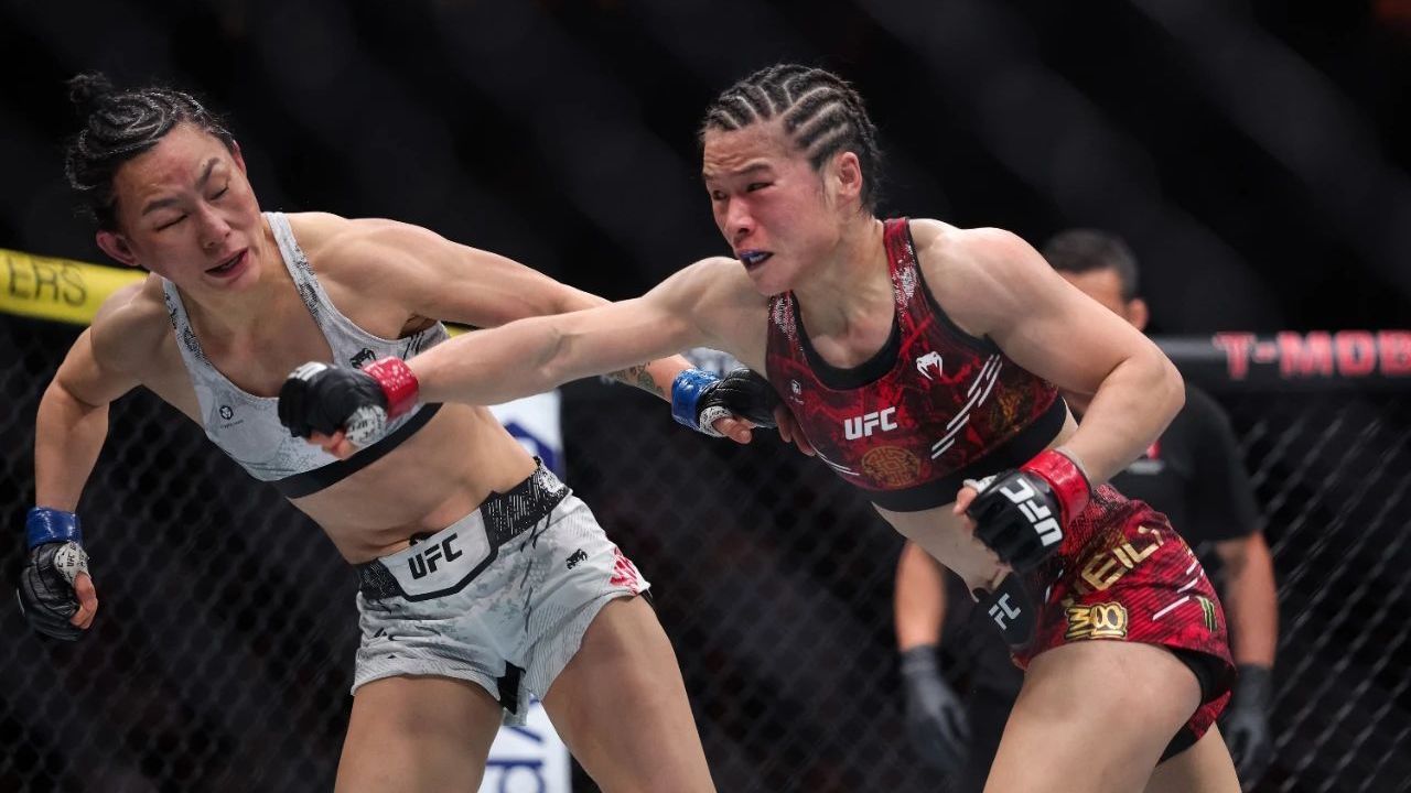 赢下UFC史上首个中国德比!张伟丽卫冕女子草量级金腰带_北京时间