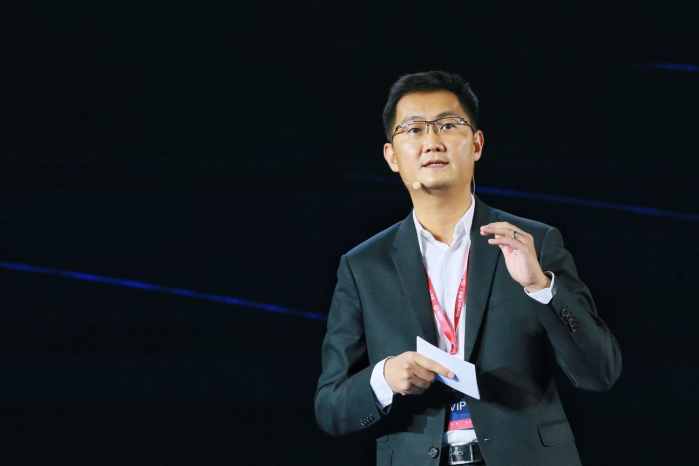 腾讯和阿里刚上市时分别买100股它们的股票,