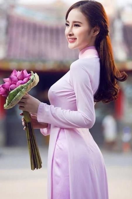 越南美女旗袍开叉到腰带,越南女人为什么穿高