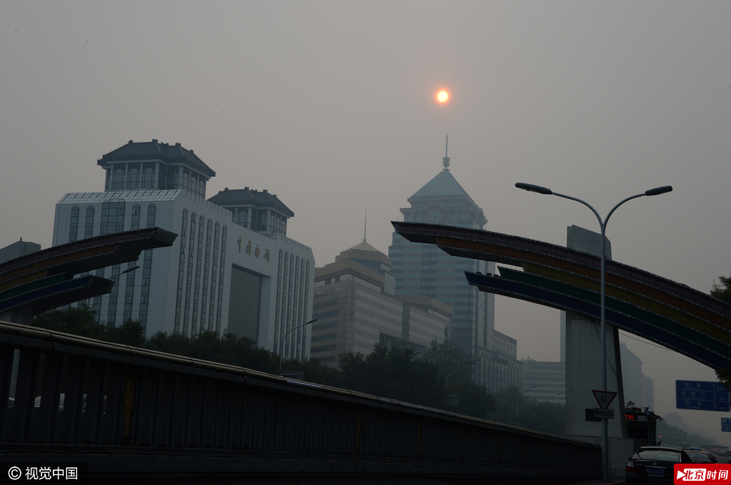 北京秋后雾霾渐活跃 消散唯有等风来