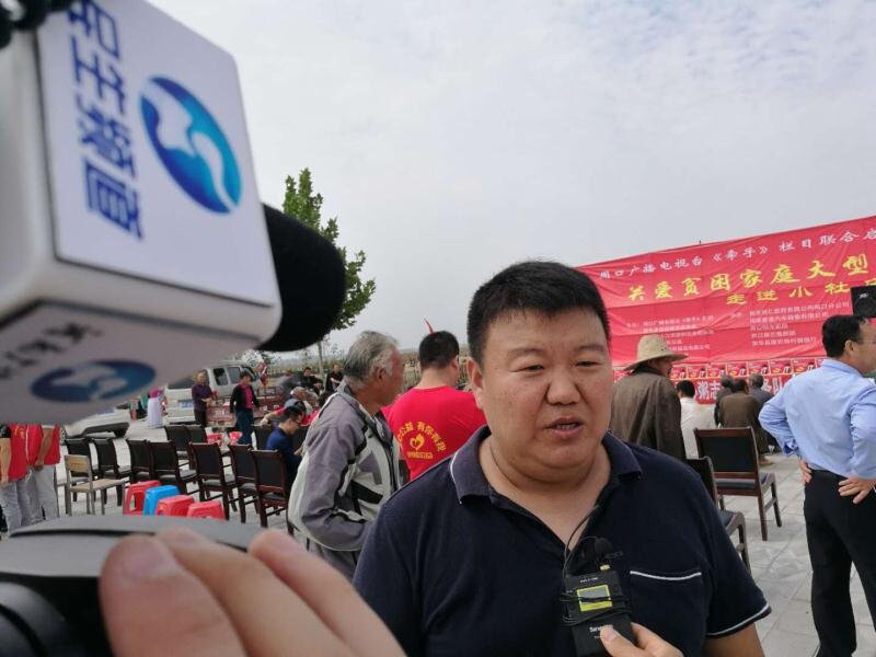 周口电视台携爱心企业在西华县逍遥镇举行关爱