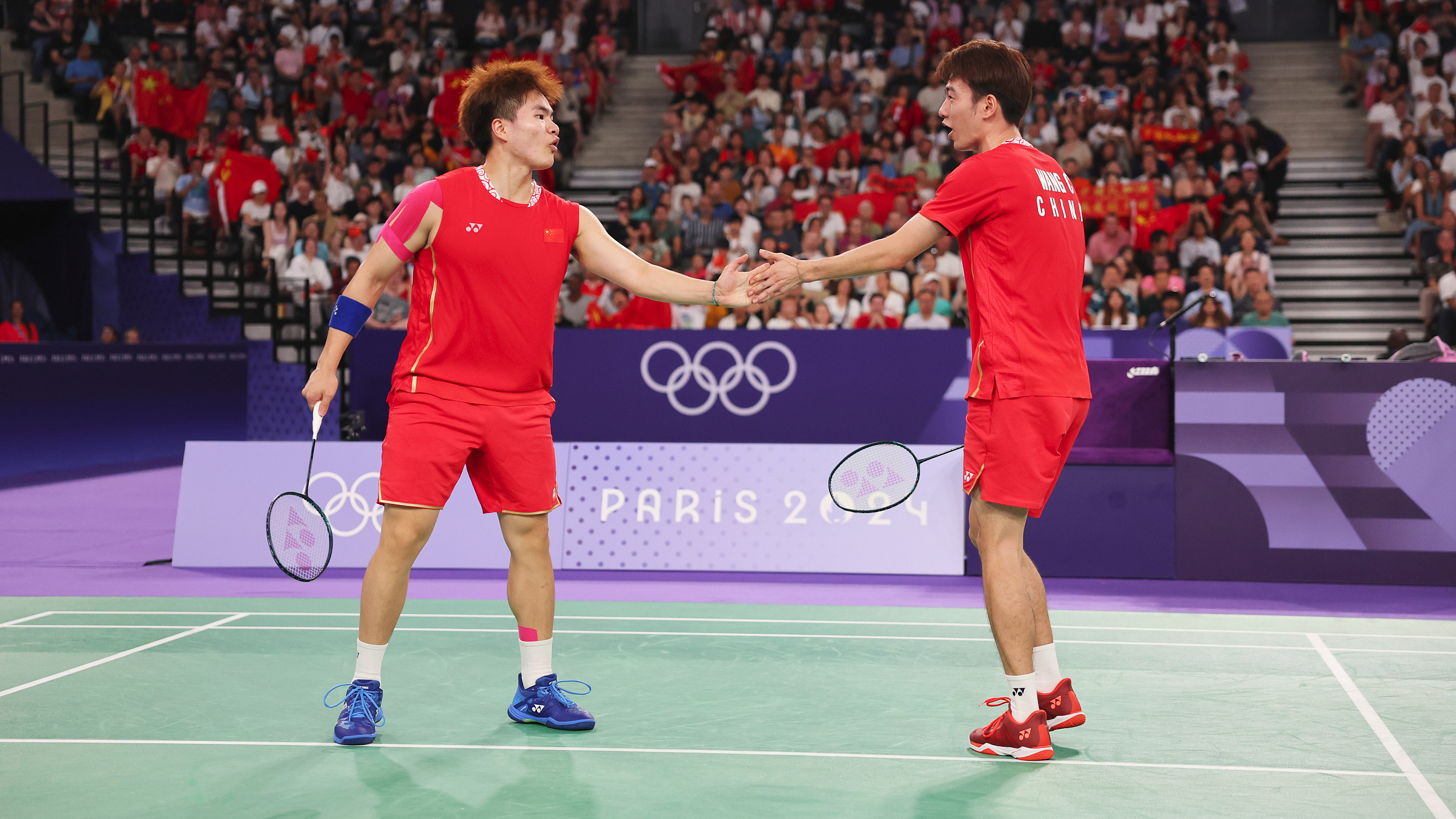 梁伟铿/王昶组合夺得羽毛球男子双打银牌 梁伟铿/王昶组合夺得羽毛球男子双打银牌