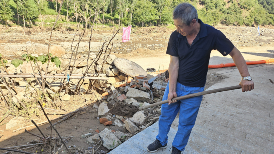 孙胡沟返村村民：对重建家园充满信心